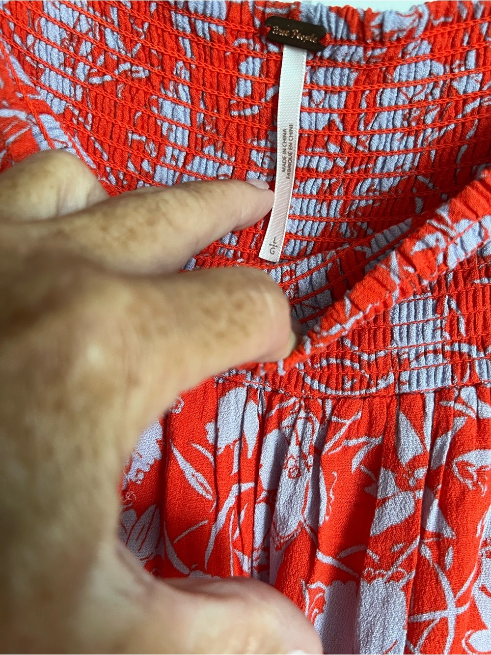 Free People Strapless Smocked Floral Dress in orange and lavender
